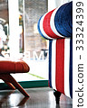 Side of red white blue strip sofa in living room 33324399