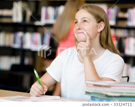 Teenage girl with books 33324713