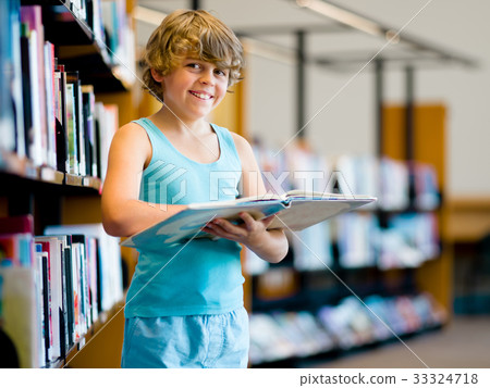 Boy in library Boy in library 33324718