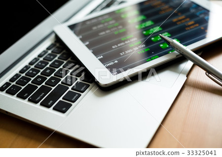 Stock exchange office with tablet pc 33325041