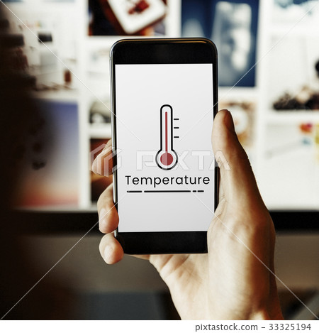 Hand working on digital device network graphic overlay 33325194