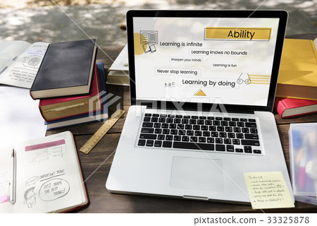 Messy table with the book and laptop foe learning Messy table with the book and laptop foe learning 33325878