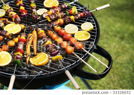 Closeup of barbecues steaks on the charcoals grill 33326032