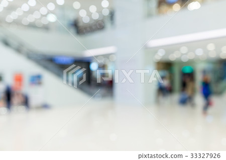 Blurred image of shopping mall and people 33327926