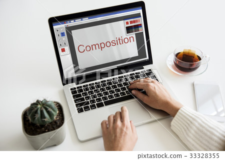 Hands working on laptop network graphic overlay 33328355