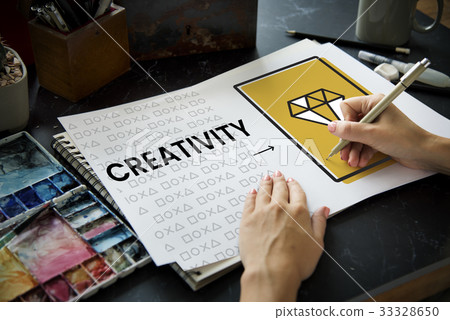 Hands working on paper network graphic overlay on table 33328650