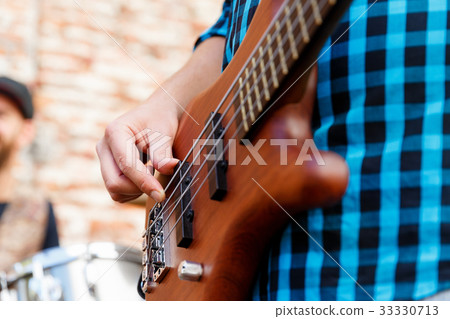Playing music in the street Playing music in the street 33330713