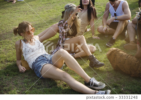 People Enjoying Talking Together at Music Concert Festival People Enjoying Talking Together at Music Concert Festival 33331248