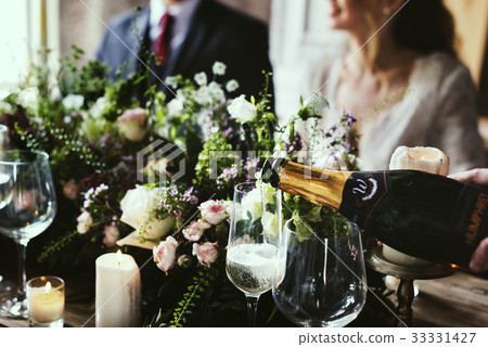 Restaurant Staff Poring Serving Wine to Customers Restaurant Staff Poring Serving Wine to Customers 33331427