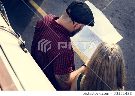 People Checking The Map for Direction on Road Trip People Checking The Map for Direction on Road Trip 33331428