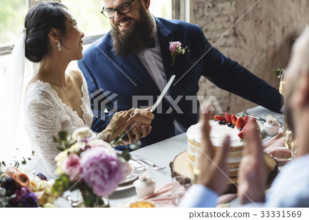 Couple Hands Holding Wedding Cake Knife Couple Hands Holding Wedding Cake Knife 33331569