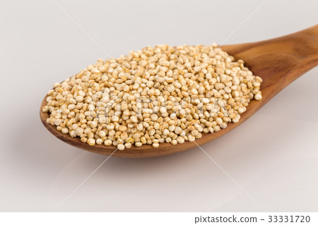 Pile of grain quinoa seeds in spoon Pile of grain quinoa seeds in spoon 33331720