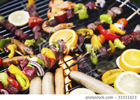 Closeup of cooking barbecue on charcoals grill Closeup of cooking barbecue on charcoals grill 33331823