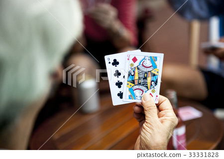 Rear view closeup of hand holding card 33331828