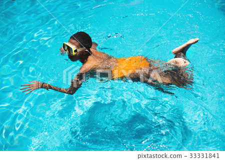 Closeup of african descent woman swim in the pool Closeup of african descent woman swim in the pool 33331841