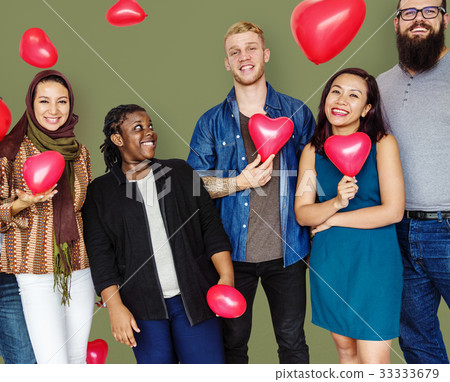 Group of Diverse People Holding Heart Balloons Cheerfully Group of Diverse People Holding Heart Balloons Cheerfully 33333679