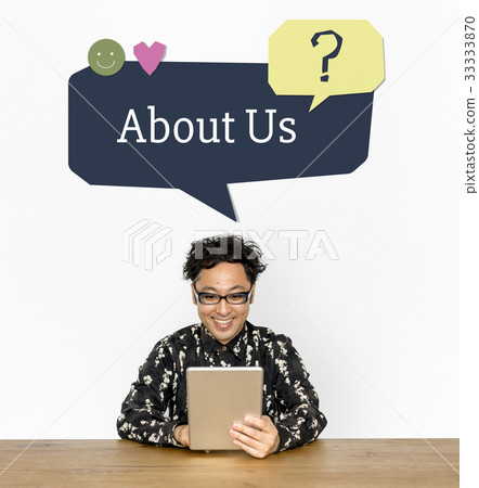 Man using digital tablet and smiling Man using digital tablet and smiling 33333870