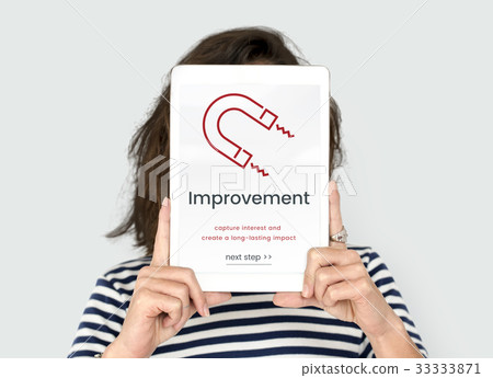 Woman holding digital device covering face network graphic overlay Woman holding digital device covering face network graphic overlay 33333871