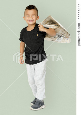 Little Boy Holding Separate Papers Studio Portrait Little Boy Holding Separate Papers Studio Portrait 33333877