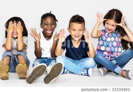 Group of happiness little children sitting on the floor Group of happiness little children sitting on the floor 33333881