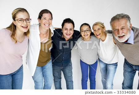 People standing in group and posing for photoshoot 33334080