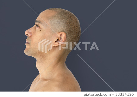 A skinhead guy is in a studio shoot 33334150