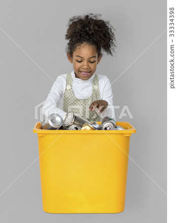 Little Girl Separating Recyclable Metal Can Studio Portrait 33334398
