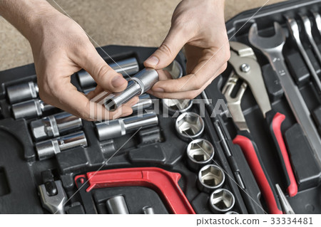 Open toolbox and male hands 33334481