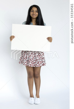 Woman standing doing photoshoot in studio Woman standing doing photoshoot in studio 33334581