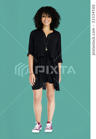 Woman standing smiling studio portrait 33334588