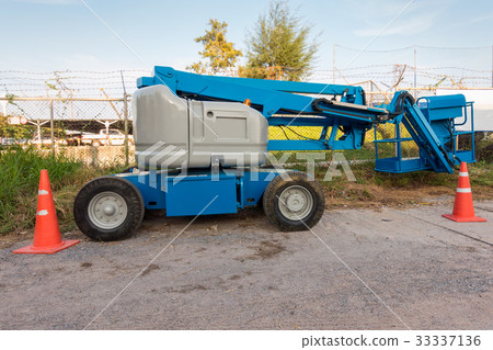 Boom lifting equipment in construction site 33337136