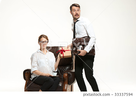 The young man and beautiful woman in business suit The young man and beautiful woman in business suit 33337594