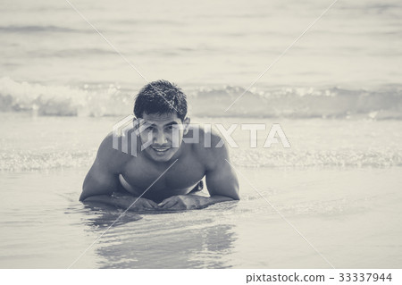 man playing and walking in sea and beach at summer 33337944