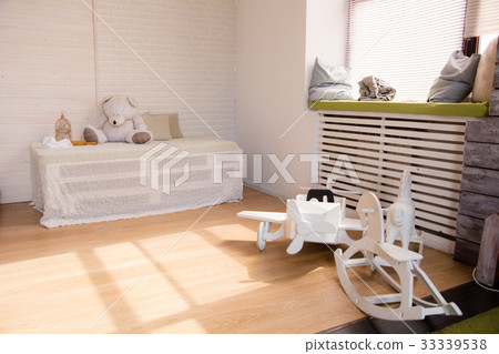 Wooden toy airplane and horses on the floor in Wooden toy airplane and horses on the floor in 33339538