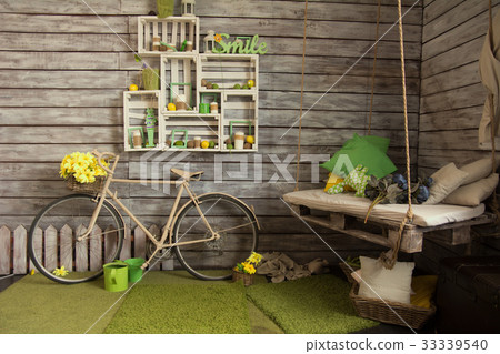 Room with wooden walls with an old bicycle Room with wooden walls with an old bicycle 33339540
