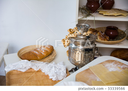 Samovar with the sheep on the table Samovar with the sheep on the table 33339566