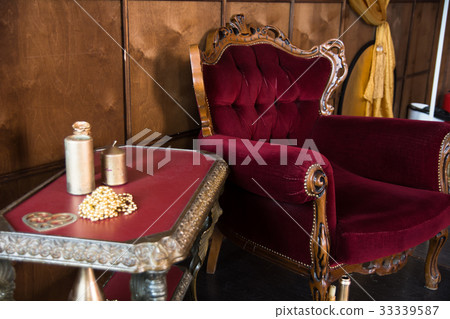 Old red furniture in the room 33339587