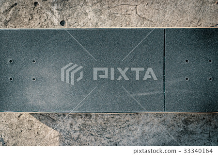 Skateboard on concrete floor in skatepark Skateboard on concrete floor in skatepark 33340164