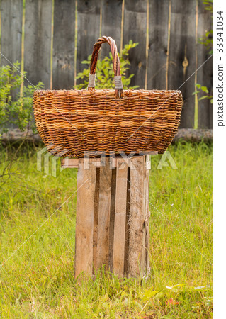 Big old weathered empty wicker laundry basket 33341034