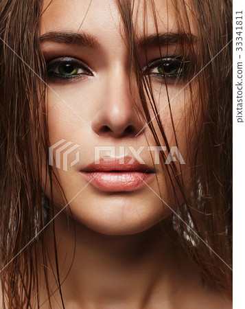 Beautiful woman with wet hair and make-up 33341811