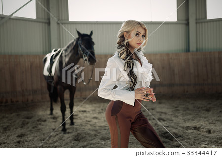 Beautiful elegant young blonde girl 33344417