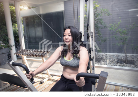 Fat woman bored tired face exercise weight loss 33345998