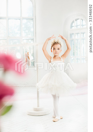 Little ballerina girl in a tutu. Adorable child Little ballerina girl in a tutu. Adorable child 33346692