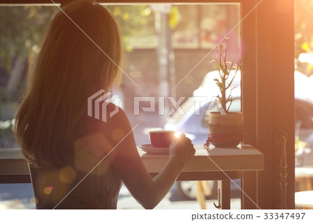 girl with the cup of coffee 33347497