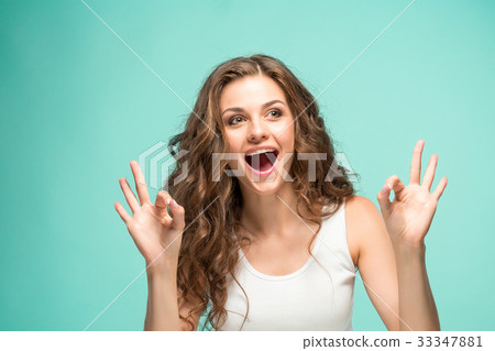 The young woman's portrait with happy emotions 33347881
