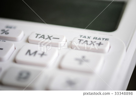 Close up of tax button business white calculator Close up of tax button business white calculator 33348898