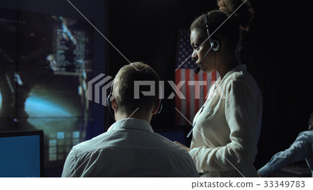 People managing flight on base 33349783