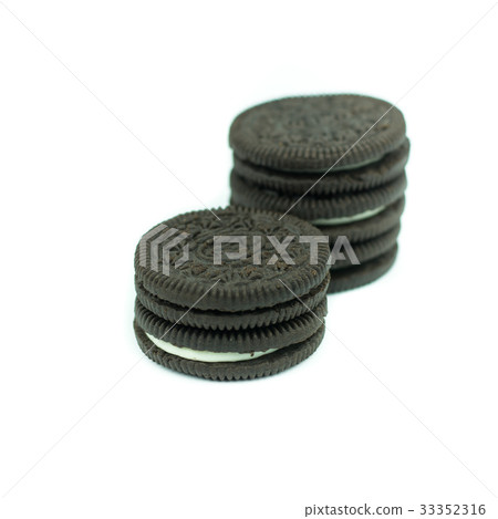 Chocolate cookies with creme filing isolated Chocolate cookies with creme filing isolated 33352316