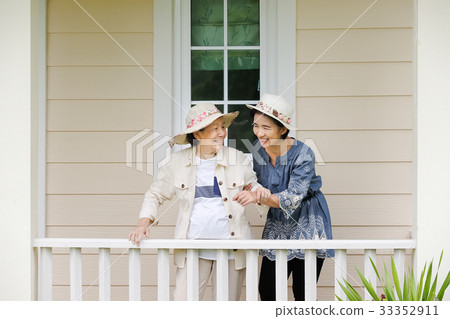 Elderly woman relax  in backyard with daughter 33352911