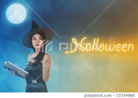 Young asian fairy woman with spellbook 33354966